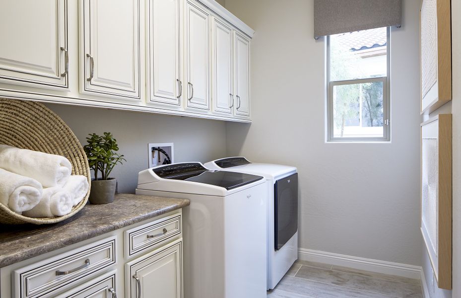 Laundry room with additional storage