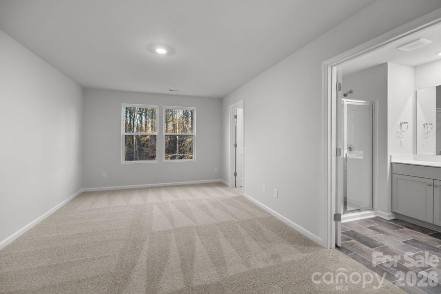 Spacious, unfurnished interior of a new home in Townes at Ribbon Walk, Charlotte (Image 10).