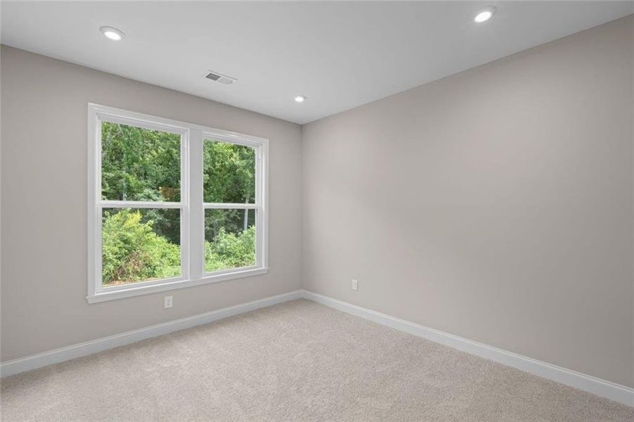 Spacious, unfurnished interior of a new home in Hidden Fields, Hoschton (Image 31).