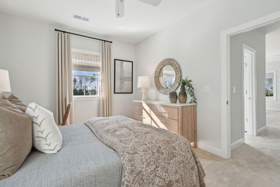 Furnished interior view inside a new home in Tidewater at Lakes of Cane Bay, Summerville (Image 10).