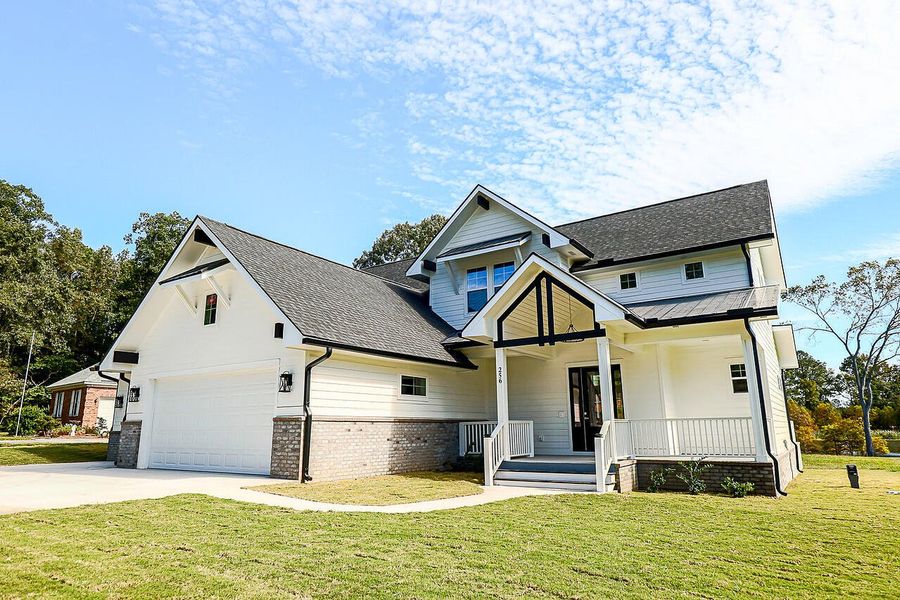 Front exterior of a new home in , Manning, SC, highlighting curb appeal (Image 1).