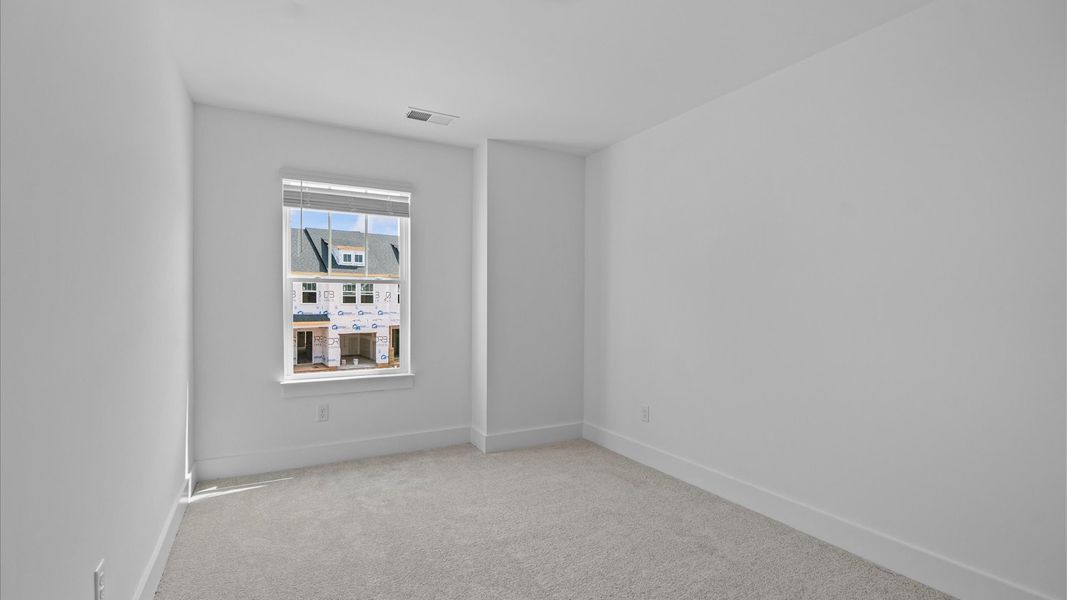First-class bedroom with generous proportions, a walk-in closet, and beautiful natural light through large windows First-class bedroom with generous proportions, a walk-in closet, and beautiful natural light through large windows