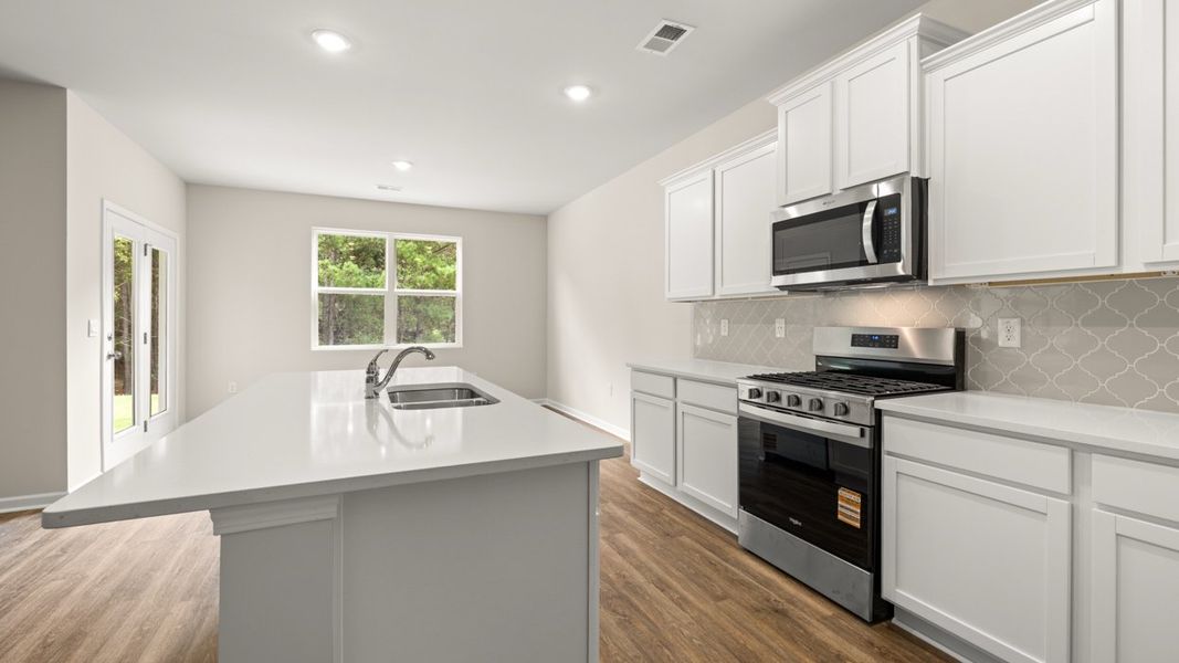 Furnished interior view inside a new home in Kingston Ranch at Lake Oconee, Buckhead (Image 6).