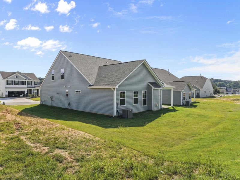 Front exterior of a new home in Hopewell Garden, Winston-Salem, NC, highlighting curb appeal (Image 23). Front exterior of a new home in Hopewell Garden, Winston-Salem, NC, highlighting curb appeal (Image 23).