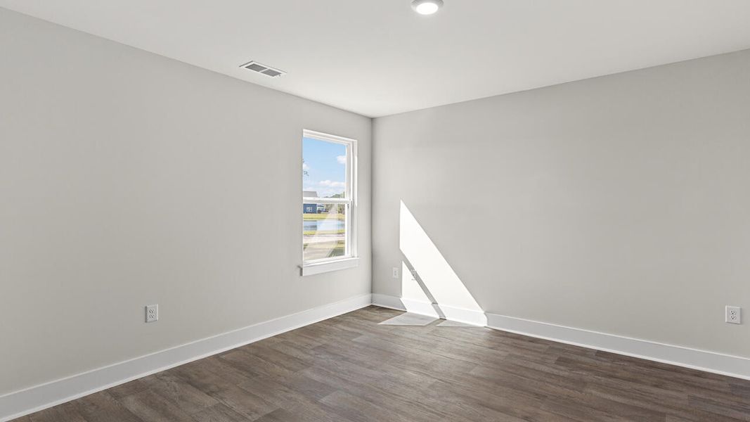 Spacious, unfurnished interior of a new home in Sidbury Station, Castle Hayne (Image 21).