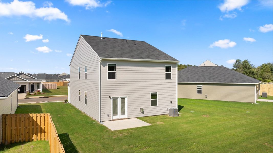 Exterior details and patio area of a home in The Islands, Beech Island (Image 23).