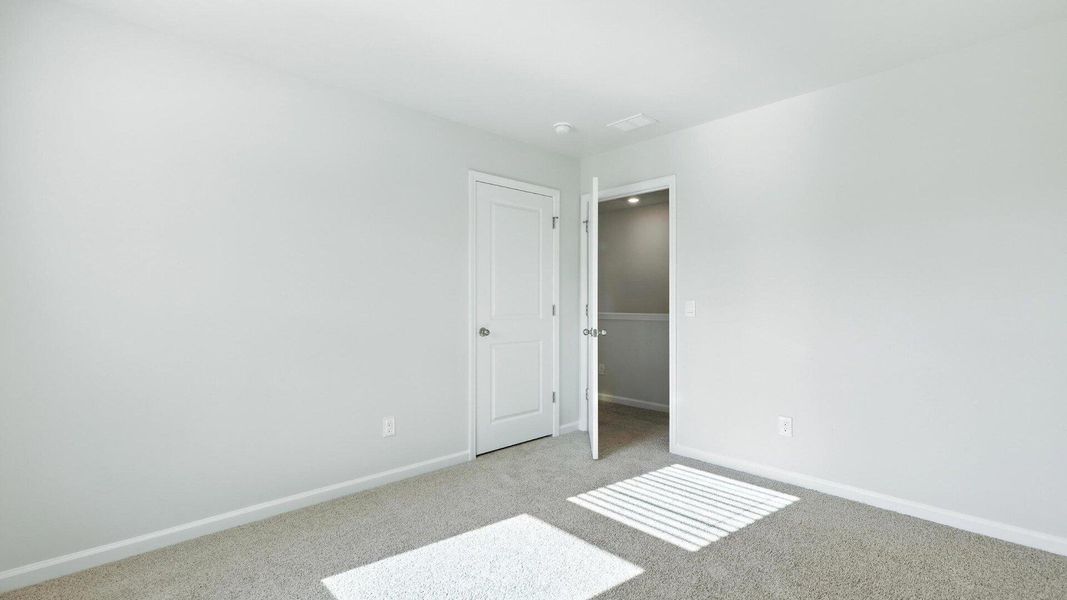 Spacious, unfurnished interior of a new home in The Ranch, Holly Hill (Image 27).