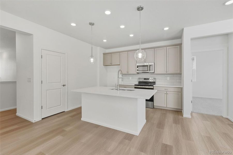 Furnished interior view inside a new home in The Cottages Collection at Ridgeline Vista, Brighton (Image 3).