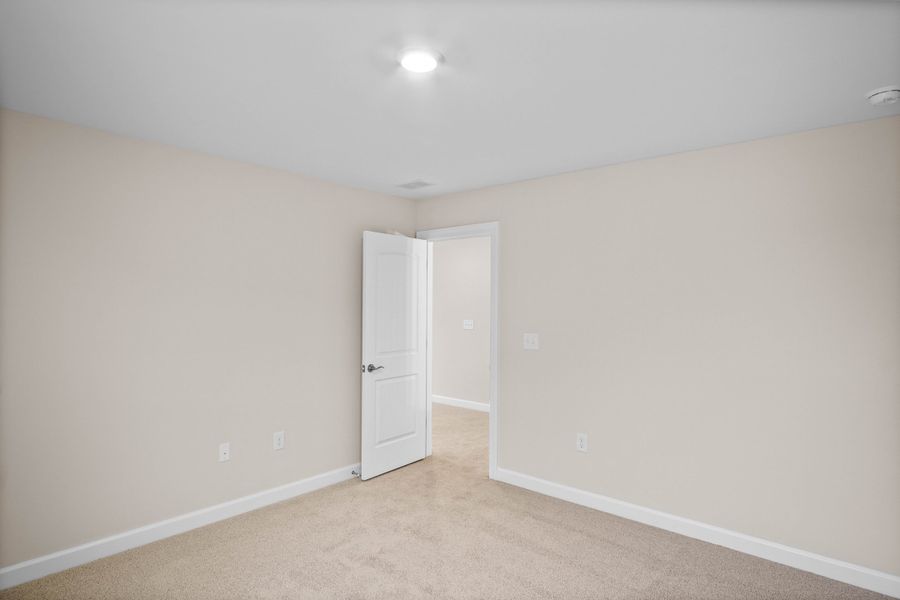 Spacious, unfurnished interior of a new home in Waterbridge, Myrtle Beach (Image 29).
