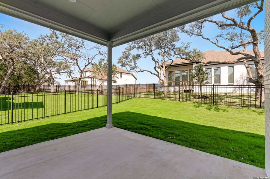 Exterior details and patio area of a home in Prominence, San Antonio (Image 25).