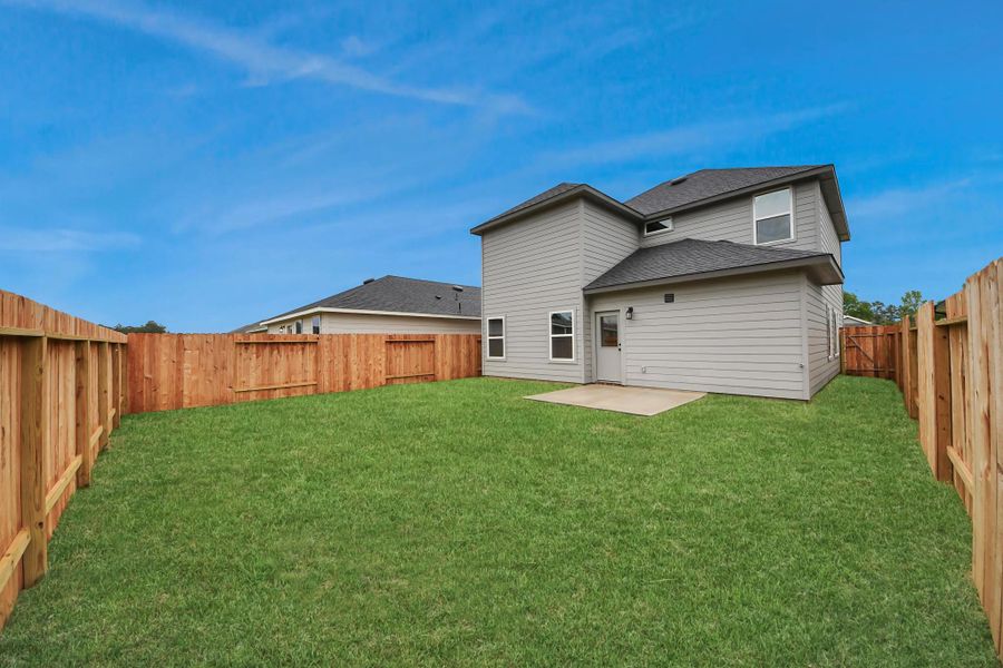 Exterior details and patio area of a home in The Enclave at Spring Branch, Montgomery (Image 3).