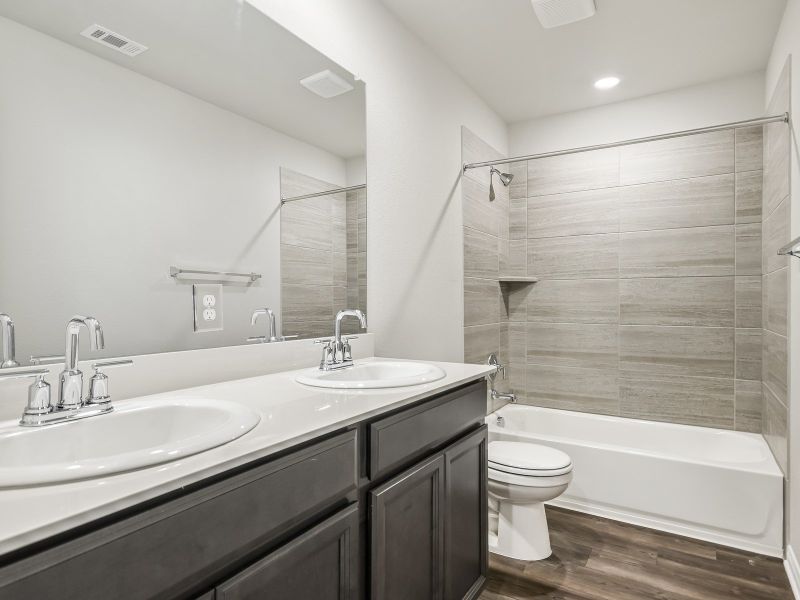 Furnished interior view inside a new home in Butler Farms - Reserve Collection, Liberty Hill (Image 5).