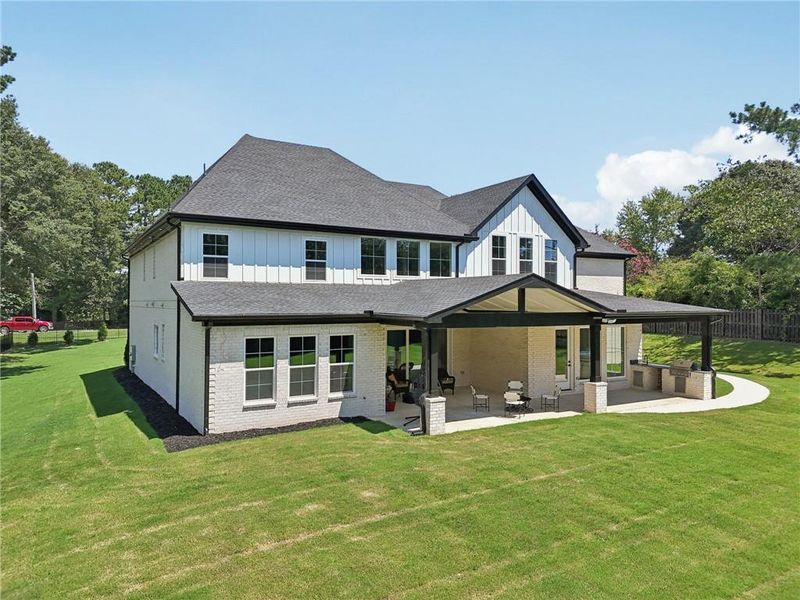 Front exterior of a new home in , Hoschton, GA, highlighting curb appeal (Image 26). Front exterior of a new home in , Hoschton, GA, highlighting curb appeal (Image 26).