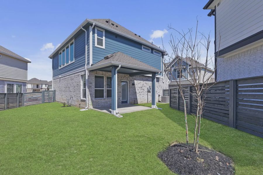 Representative exterior details of a home built from the Springfield by Chesmar Homes in Bridgeland, Elgin (Image 3).