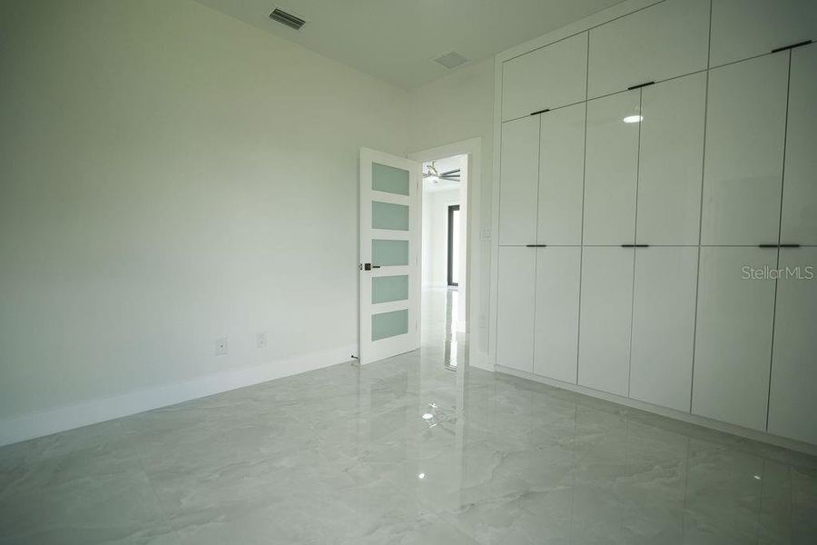 Spacious, unfurnished interior of a new home in , Port Charlotte (Image 31).