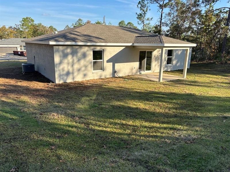Exterior details and patio area of a home in , Citrus Springs (Image 17).