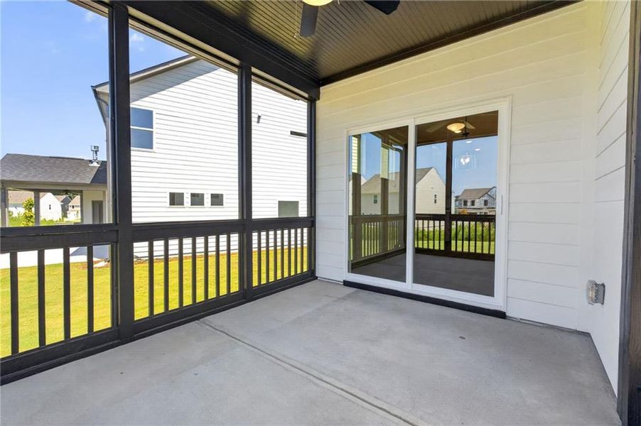 Exterior details and patio area of a home in Twin Lakes, Hoschton (Image 23).