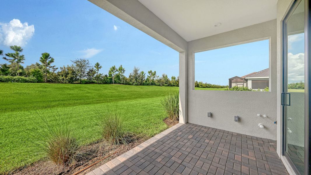 Exterior details and patio area of a home in Palm Grove Real Estate and Homes for Sale in Lakewood Ranch, FL - Neal Communities, Lakewood Ranch (Image 24). Exterior details and patio area of a home in Palm Grove Real Estate and Homes for Sale in Lakewood Ranch, FL - Neal Communities, Lakewood Ranch (Image 24).