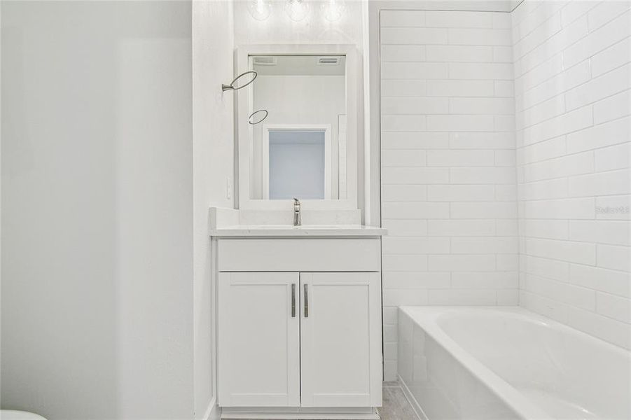 Furnished interior view inside a new home in Towns at Union, St. Petersburg (Image 21).