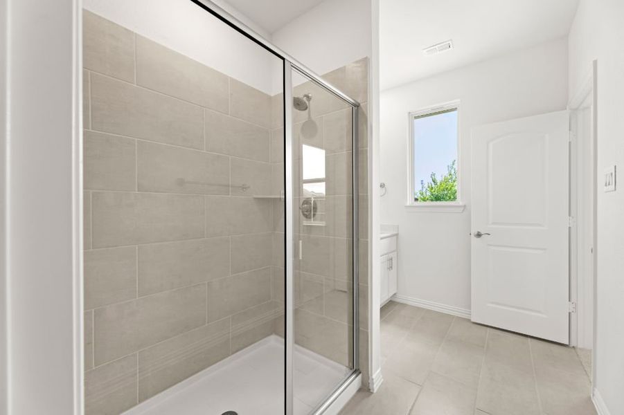 Representative furnished interior of a home built from the Chisholm by UnionMain Homes in Reunion, Rhome (Image 11).