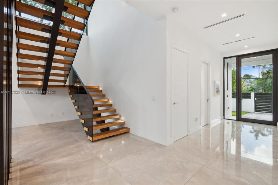 Floating Staircase and Foyer entry