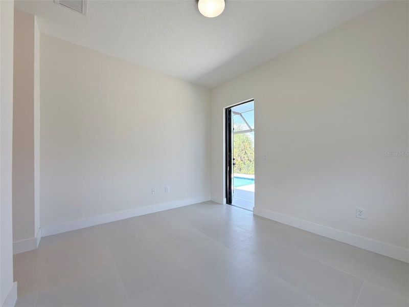 Spacious, unfurnished interior of a new home in , Port Charlotte (Image 21).