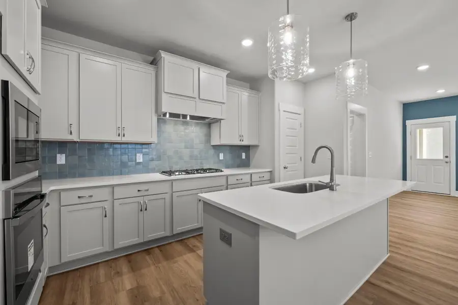 Representative furnished interior of a home built from the Bliss by Garman Homes in Golden Gate, High Point (Image 4).