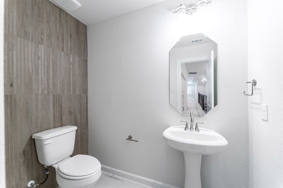 Furnished interior view inside a new home in Heath Golf & Yacht Club, Heath (Image 13).