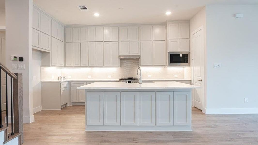 Furnished interior view inside a new home in The Abbey at Mercer Crossing, Farmers Branch (Image 11).