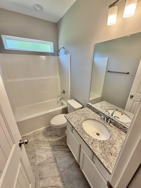Furnished interior view inside a new home in Stone Fort Meadows, Manchester (Image 4).