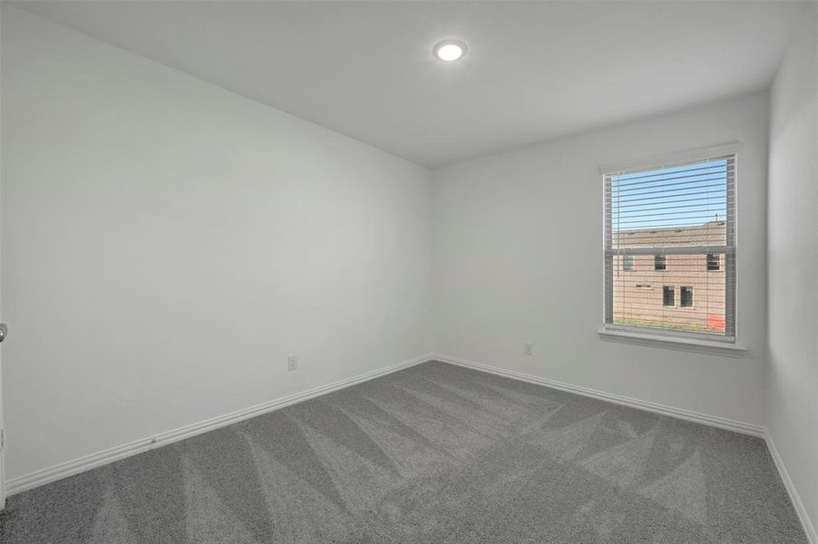 Spacious, unfurnished interior of a new home in Lily Creek at Sutton Fields, Aubrey (Image 20).