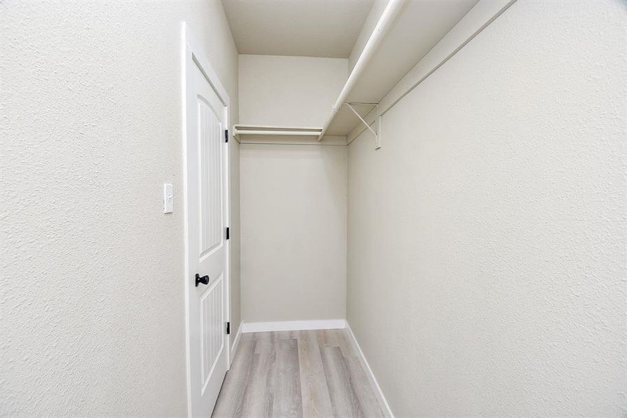 Primary Bedroom Walk In Closet