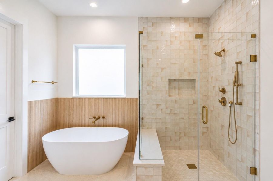 Primary bathroom with a large shower and a soaking tub Primary bathroom with a large shower and a soaking tub