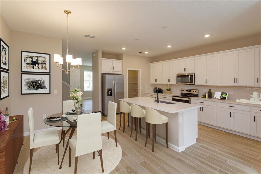 Furnished interior view inside a new home in Serenade at Ovation, Winter Garden (Image 5).