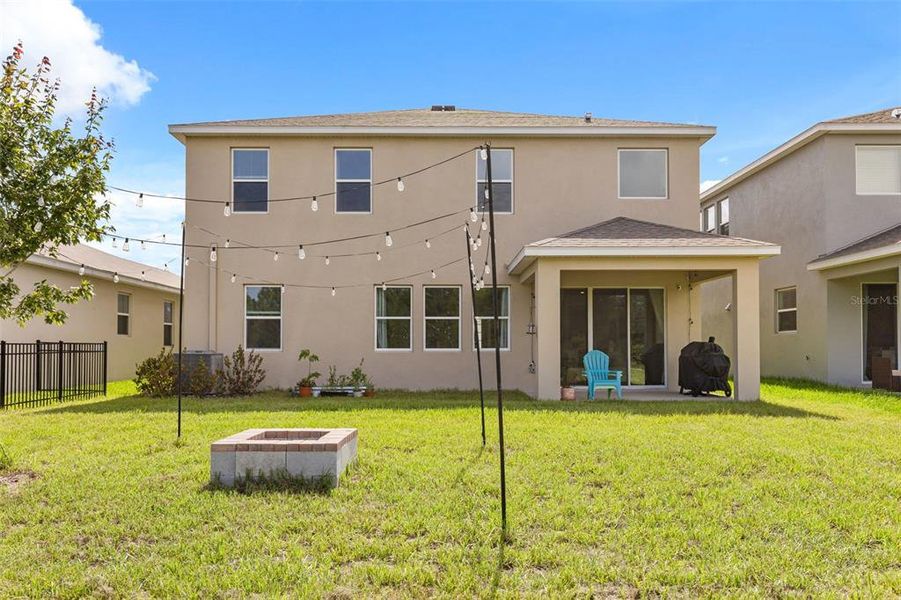 Exterior details and patio area of a home in Deerbrook, Land O' Lakes (Image 24).