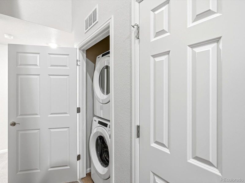 Furnished interior view inside a new home in Three Hills, Morrison (Image 12).