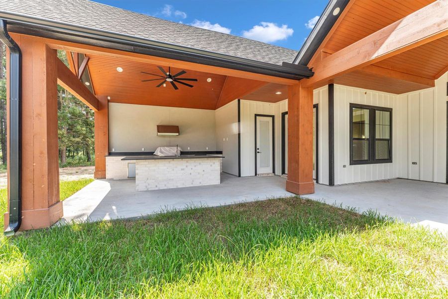 Front exterior of a new home in , Conroe, TX, highlighting curb appeal (Image 23).