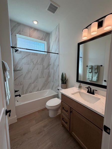 Furnished interior view inside a new home in Sienna, Missouri City (Image 6).