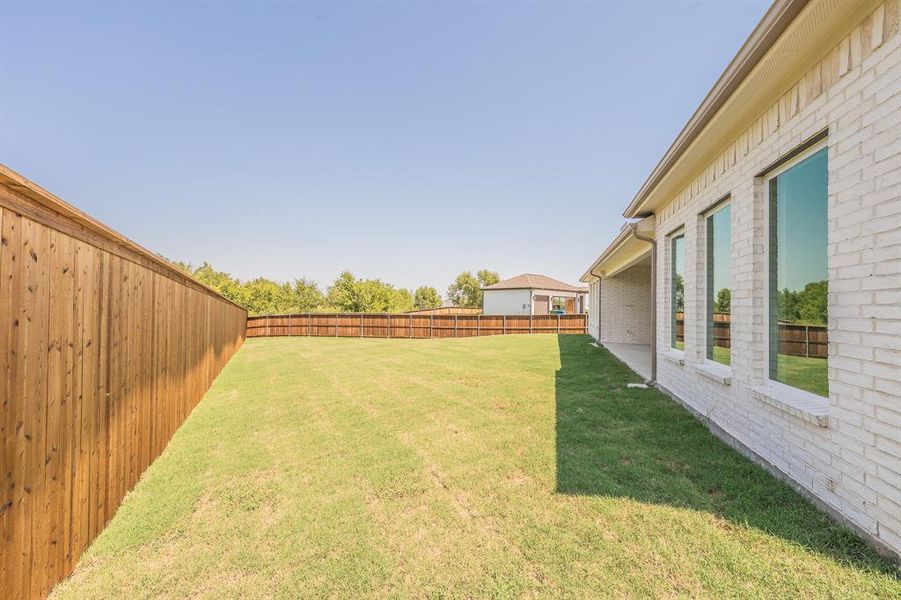 Front exterior of a new home in , Haslet, TX, highlighting curb appeal (Image 23).