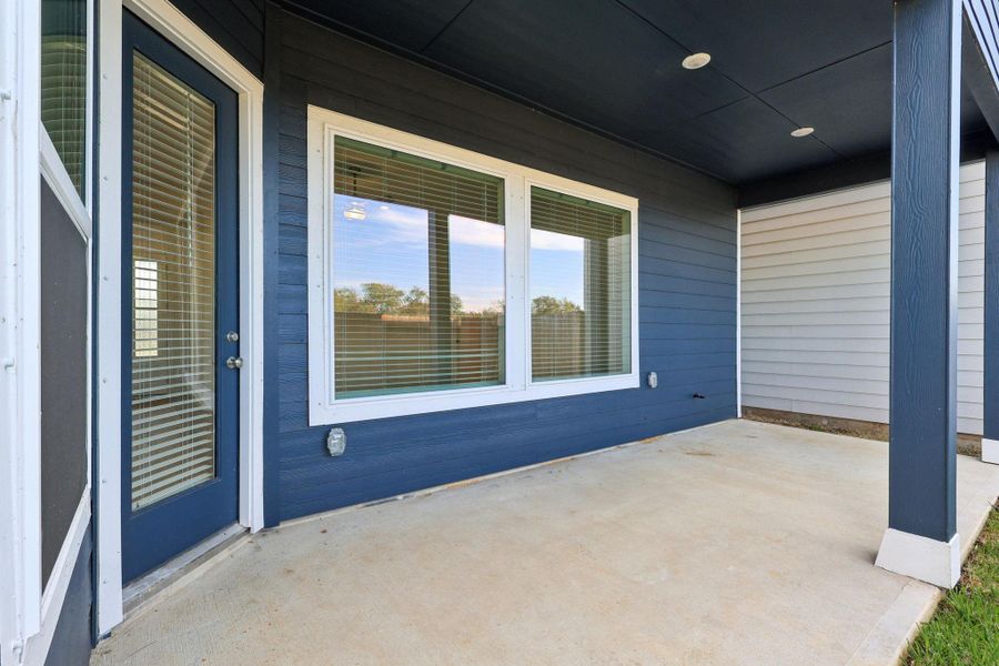 Exterior details and patio area of a home in Kemah Crossing - Luxe Series, Kemah (Image 3). Exterior details and patio area of a home in Kemah Crossing - Luxe Series, Kemah (Image 3).