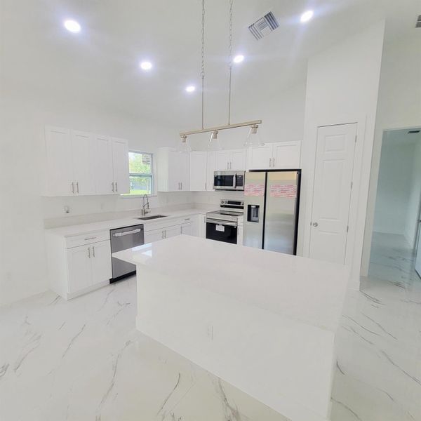 Furnished interior view inside a new home in , Okeechobee (Image 3).
