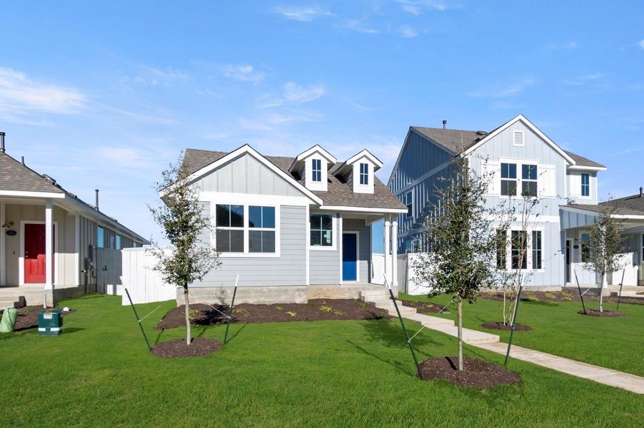 Front exterior of a new home in Harvest Ridge, Elgin, TX, highlighting curb appeal (Image 2).