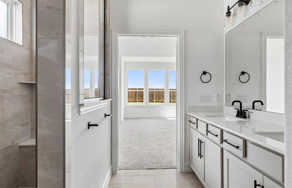 Owners bath with beautiful shower