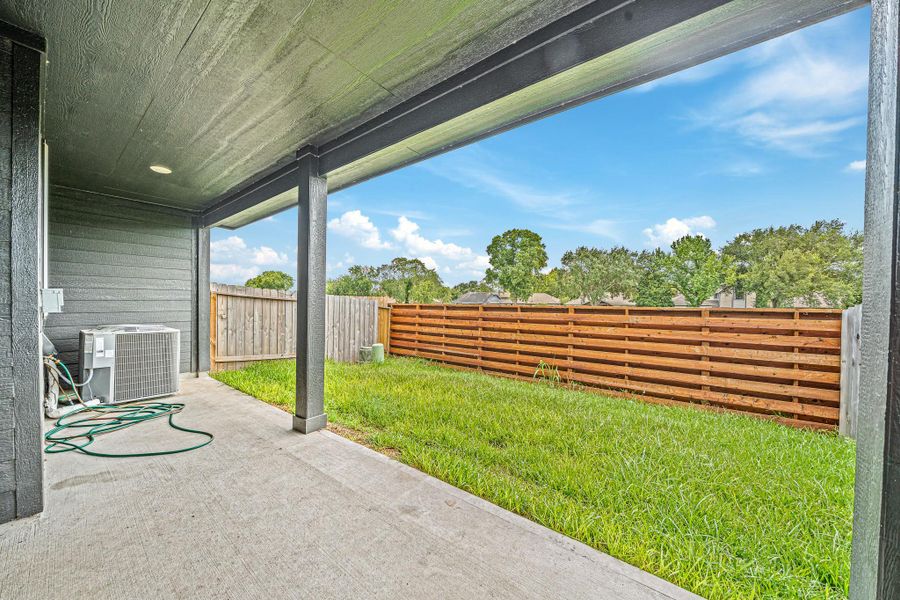 Exterior details and patio area of a home in , Houston (Image 4).