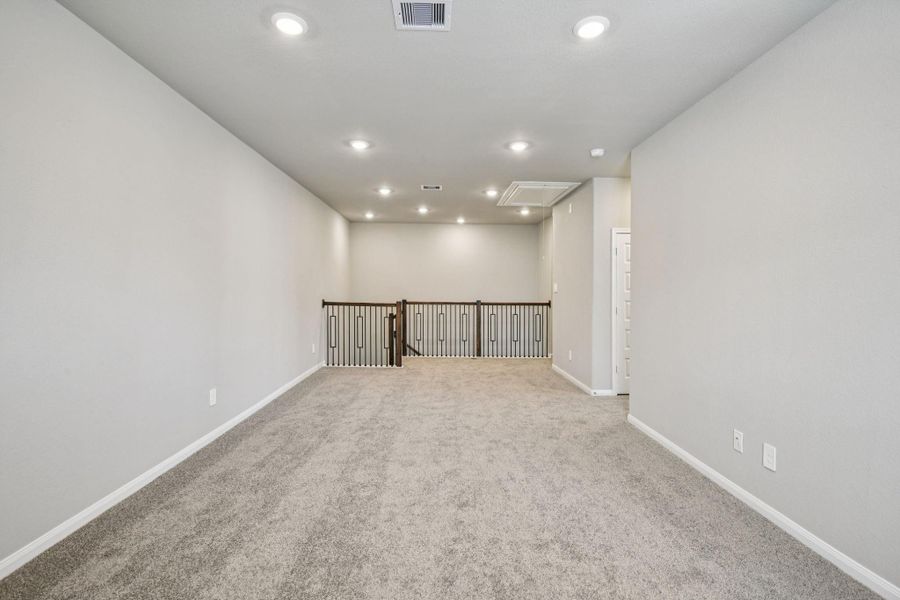 Spacious, unfurnished interior of a new home in Spring Brook Village - Luxe Series, Houston (Image 15).