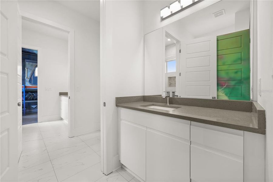 Furnished interior view inside a new home in , Kissimmee (Image 13).