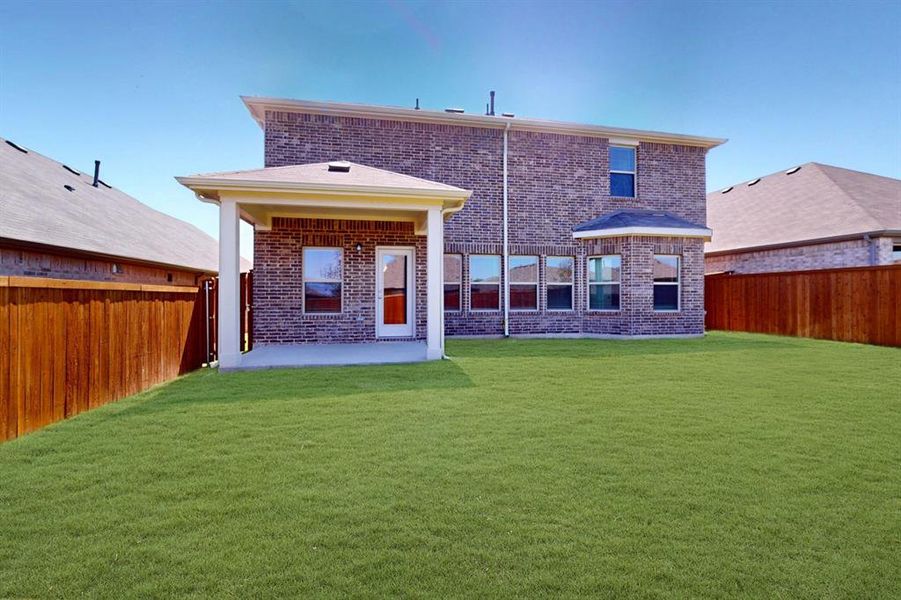 Front exterior of a new home in Sanderos, Fort Worth, TX, highlighting curb appeal (Image 18). Front exterior of a new home in Sanderos, Fort Worth, TX, highlighting curb appeal (Image 18).