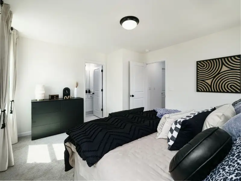 Furnished interior view inside a new home in Dukes Ridge, Charlotte (Image 15).