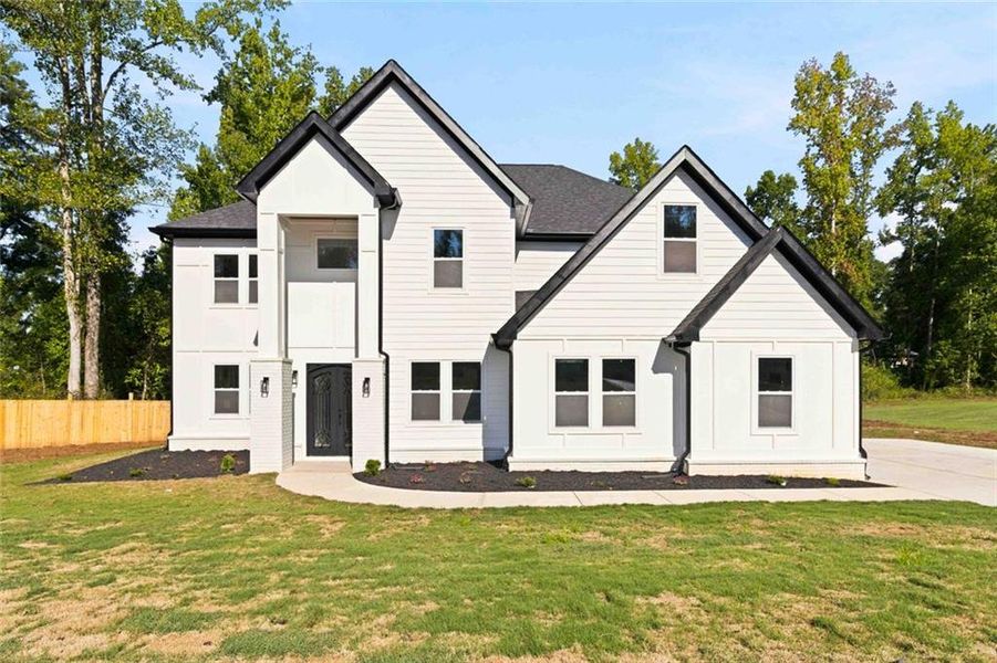 Front exterior of a new home in , Griffin, GA, highlighting curb appeal (Image 26).