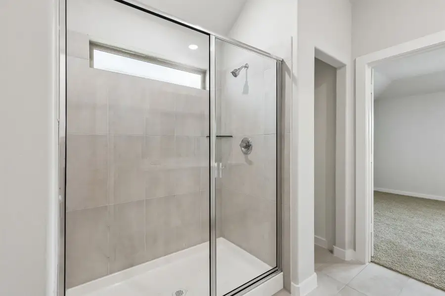 Primary Bathroom in the Oscar home plan by Trophy Signature Homes – REPRESENTATIVE PHOTO Primary Bathroom in the Oscar home plan by Trophy Signature Homes – REPRESENTATIVE PHOTO